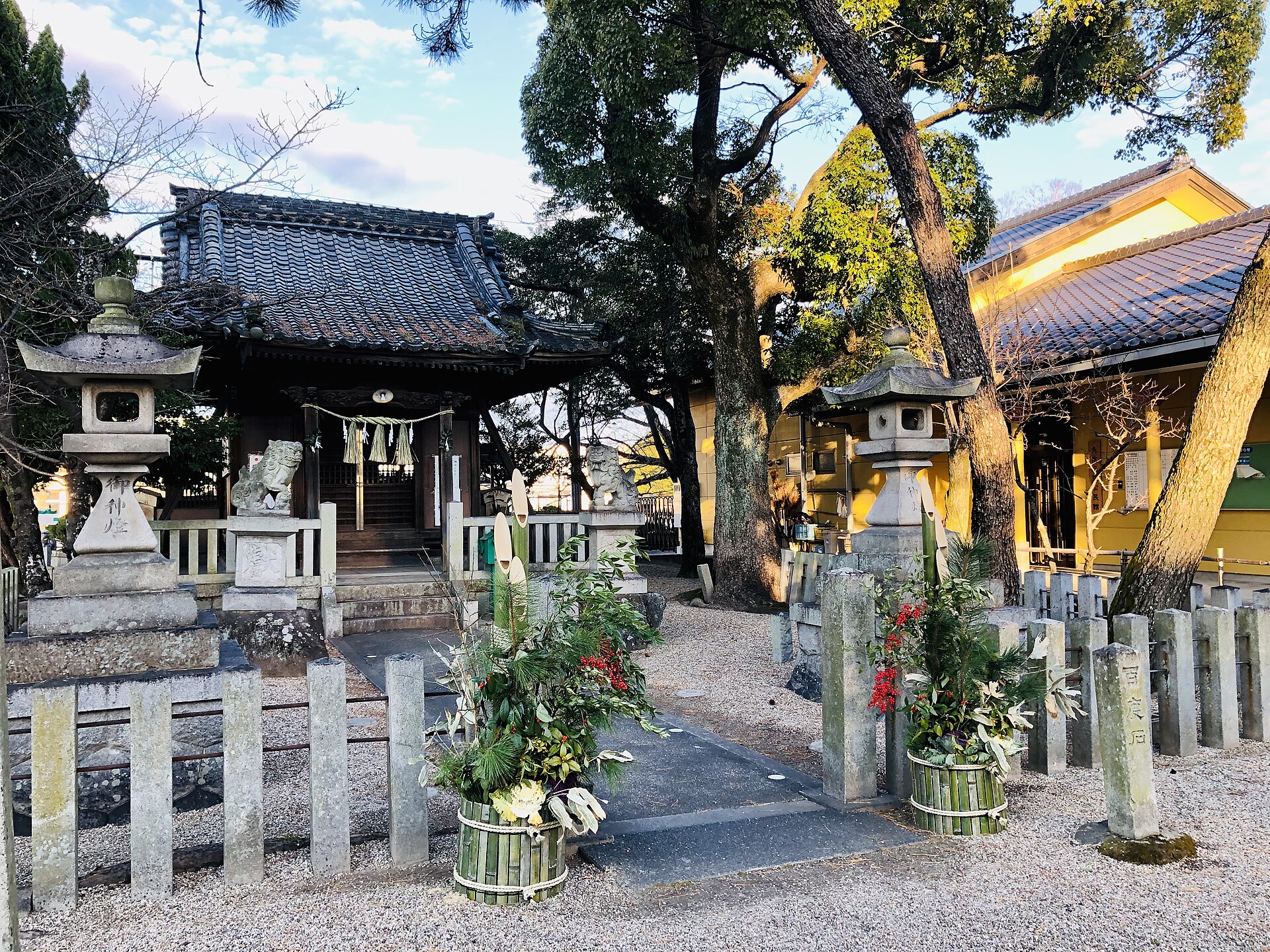 A pair of kadomatsu pine decorations at a shrine entrance