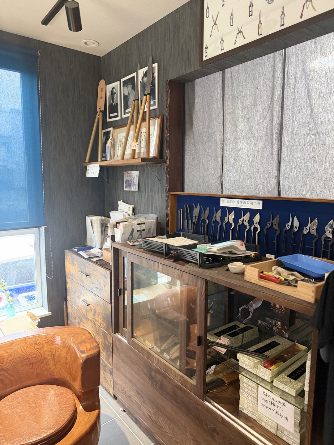 Inside the showroom with the process board above a display case