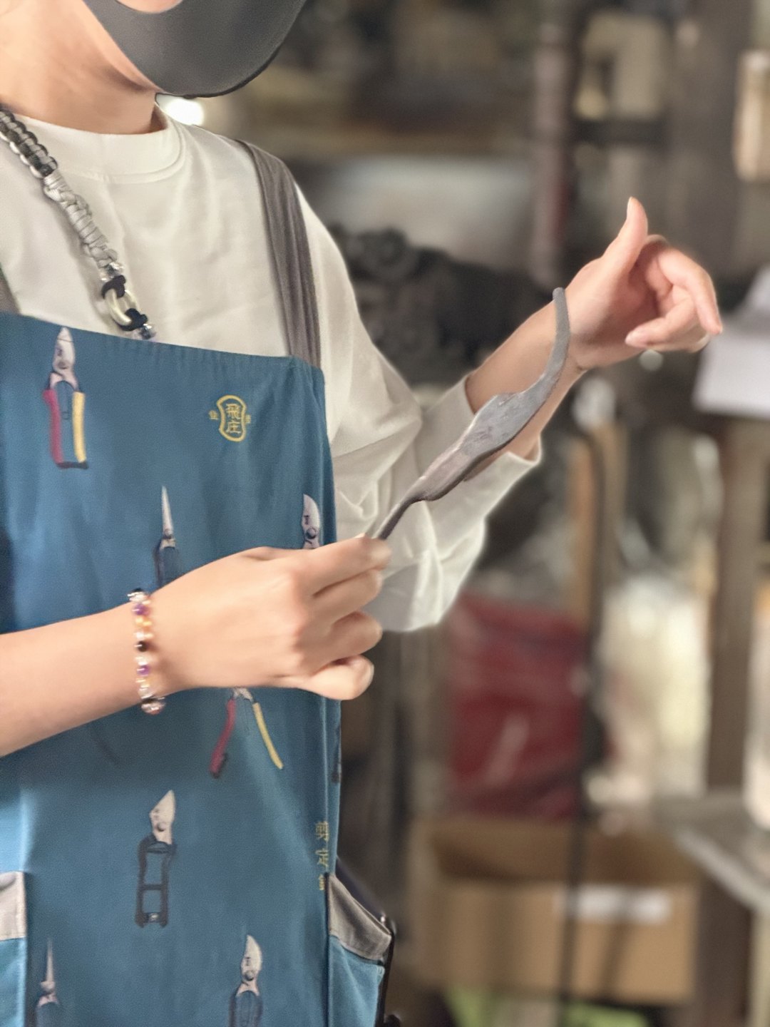 Our guide holding a blade-shaped piece of steel