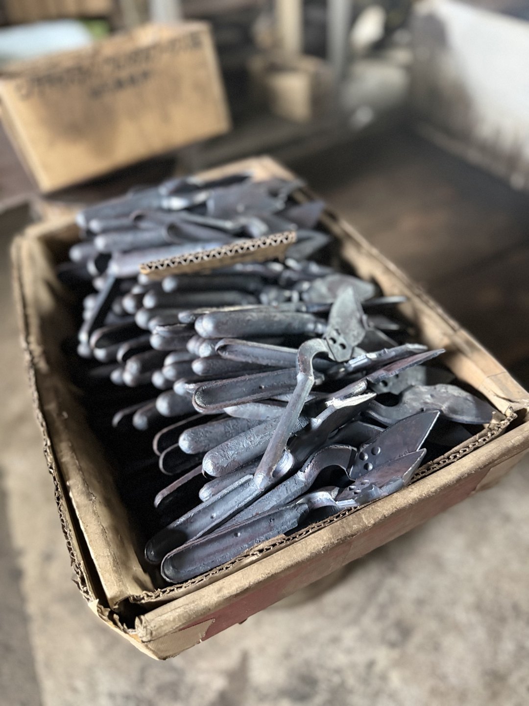 A box of pressed shear parts