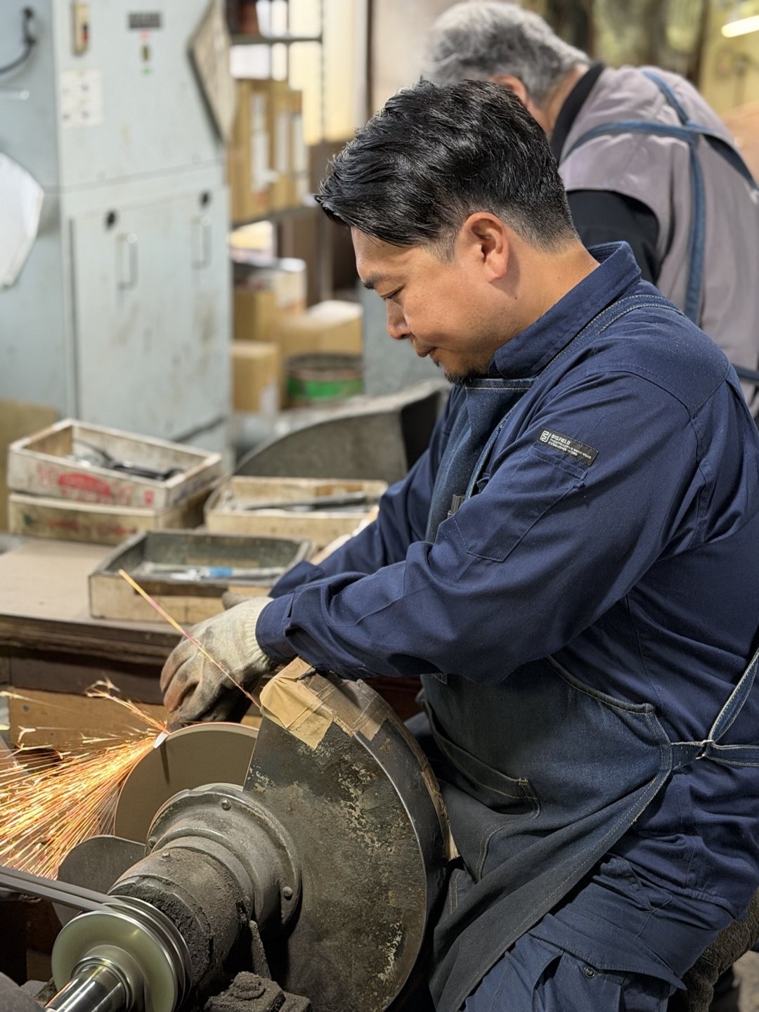 Another view of grinding at the wheel