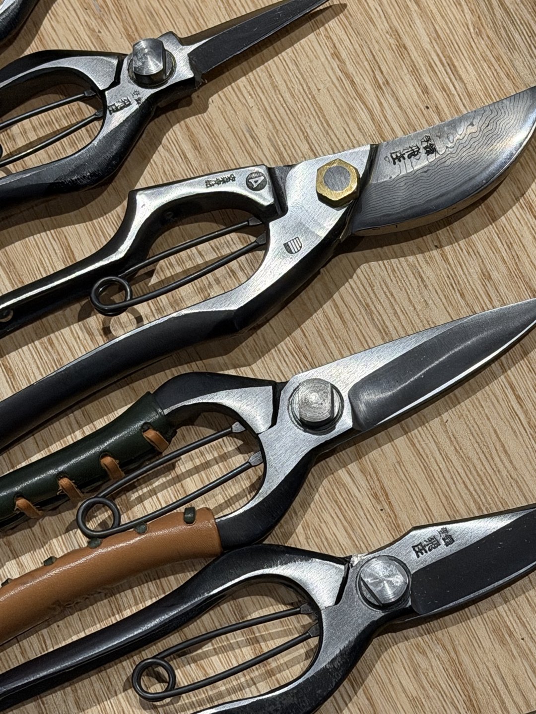 Shears laid out on a wooden table